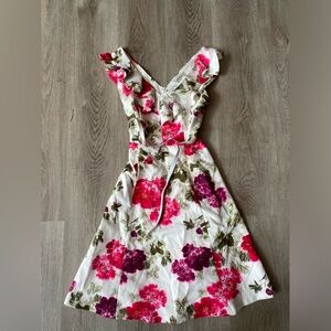 Nikibiki brand. Size small. Patterned floral dress.